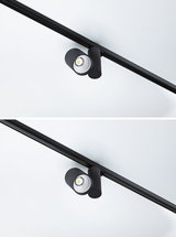 Schwarzer LED-Spot aus Metall an Schienensystem für flexible Raumbeleuchtung und Akzentsetzung