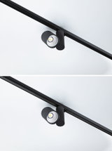 Sort LED-spot i metal på skinne til fleksibel rumbelysning og accentbelysning