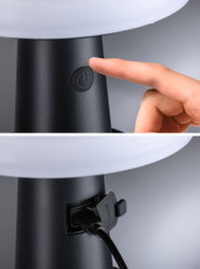 Black lamp base with power button and charging port for LED table lamp made of plastic.
