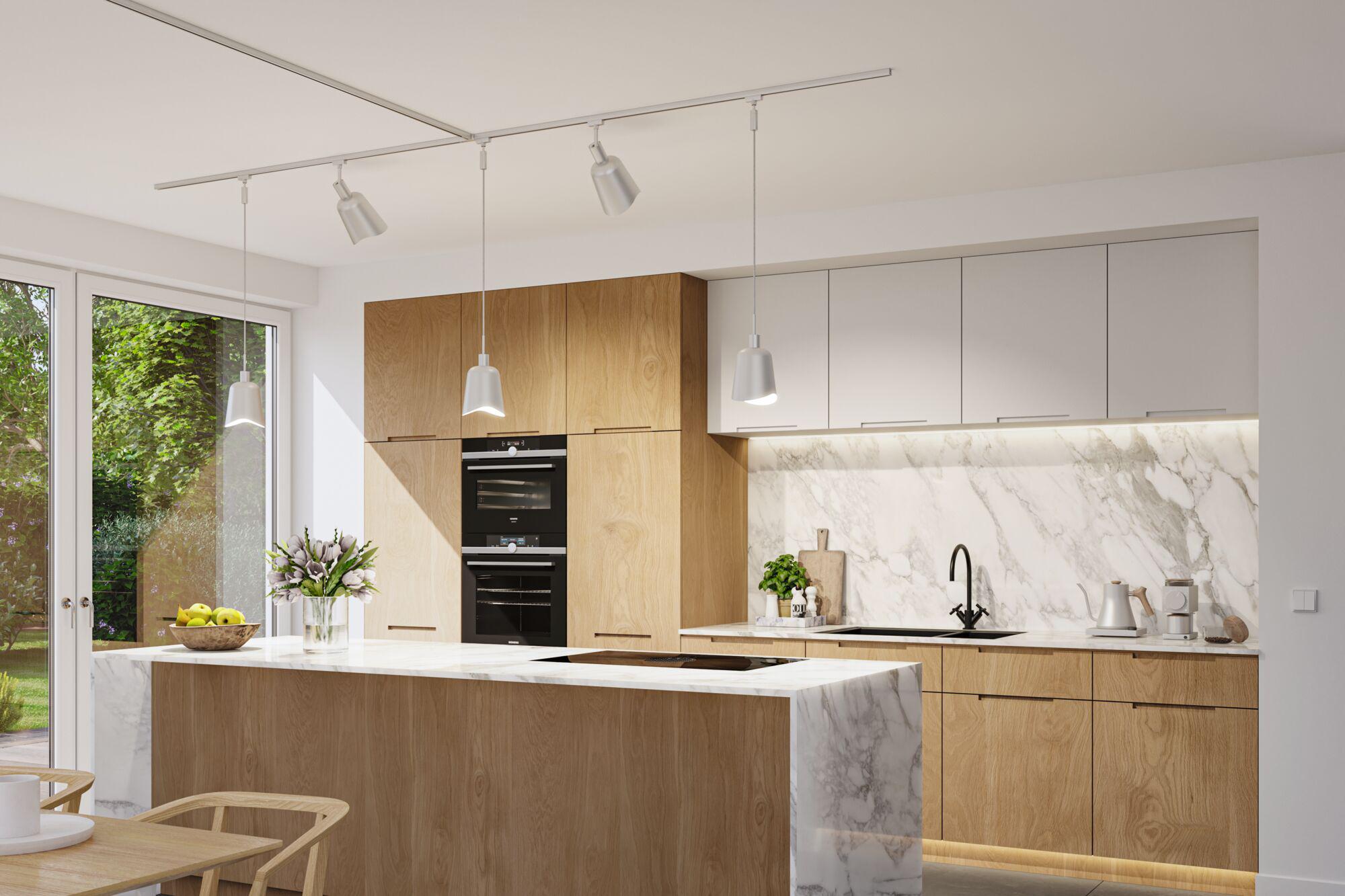 Modern kitchen with wood cabinets, white marble countertop, and minimalist LED pendant lighting.