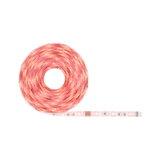 Roll of red LED strip light with flexible plastic base for decorative lighting use.