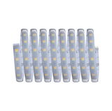 Flexible LED strip with warm white LEDs and adhesive backing for versatile lighting solutions.