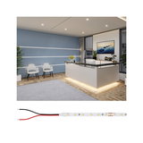 LED-lysbånd med varm hvid belysning i moderne kontor med reception og blå væg.
