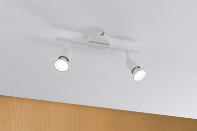 Modern white metal ceiling spotlight with two adjustable LED lights for living spaces.