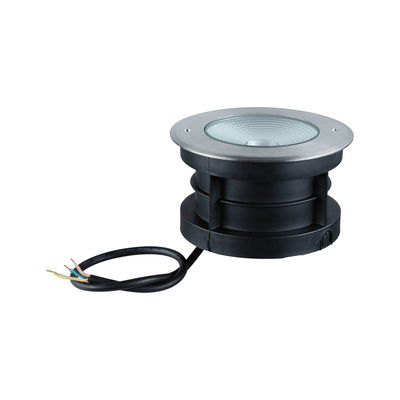 Round black plastic recessed ground light with stainless steel rim and cable for outdoor lighting