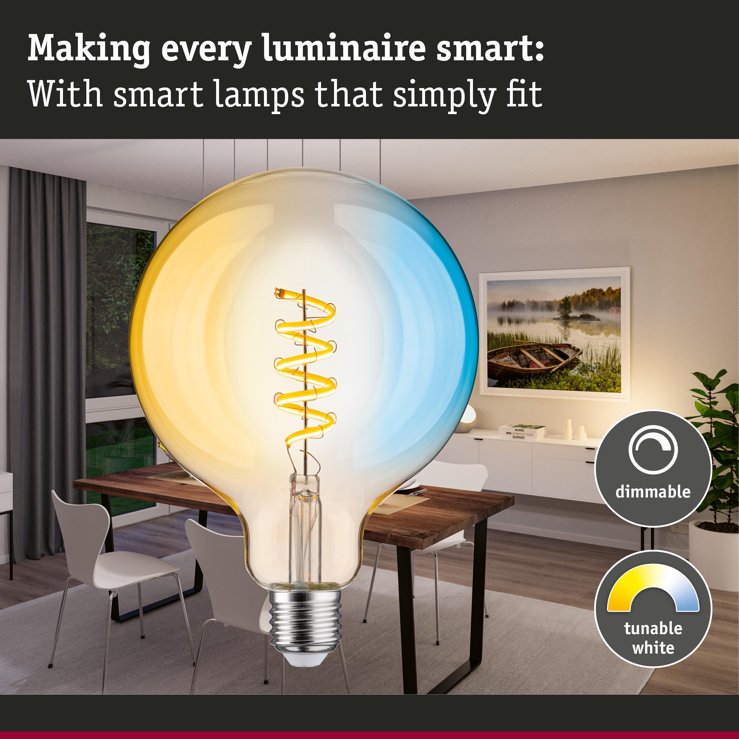 Smart dimmable LED bulb with tunable white light shown in a modern dining room setting