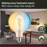 Smart dimmable LED bulb with tunable white light shown in a modern dining room setting