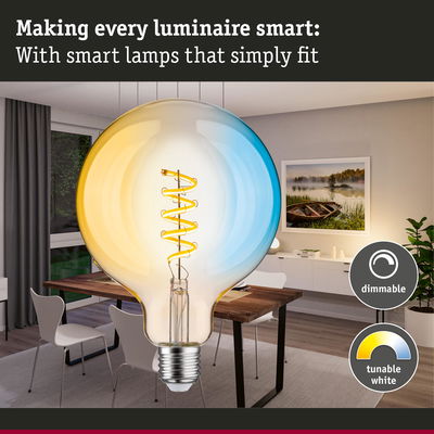 Smart dimmable LED bulb with tunable white light shown in a modern dining room setting