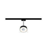 Spot LED noir sur rail avec tête ronde et lumière blanc chaud pour éclairage intérieur moderne.