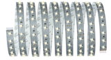 Flexible LED strip with warm white LEDs on silver circuit board for versatile lighting solutions.