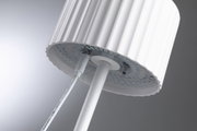 White LED floor lamp with ribbed shade and built-in USB port for modern lighting solutions
