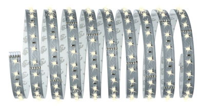 Flexible LED strip with warm white LEDs on silver circuit board for decorative lighting