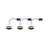 Three recessed spotlights with wooden trim and black inner ring, LED lights with cable and connector box.