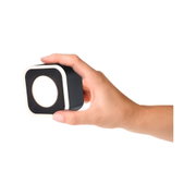 Compact square black LED light with white ring, handheld and modern for home lighting solutions