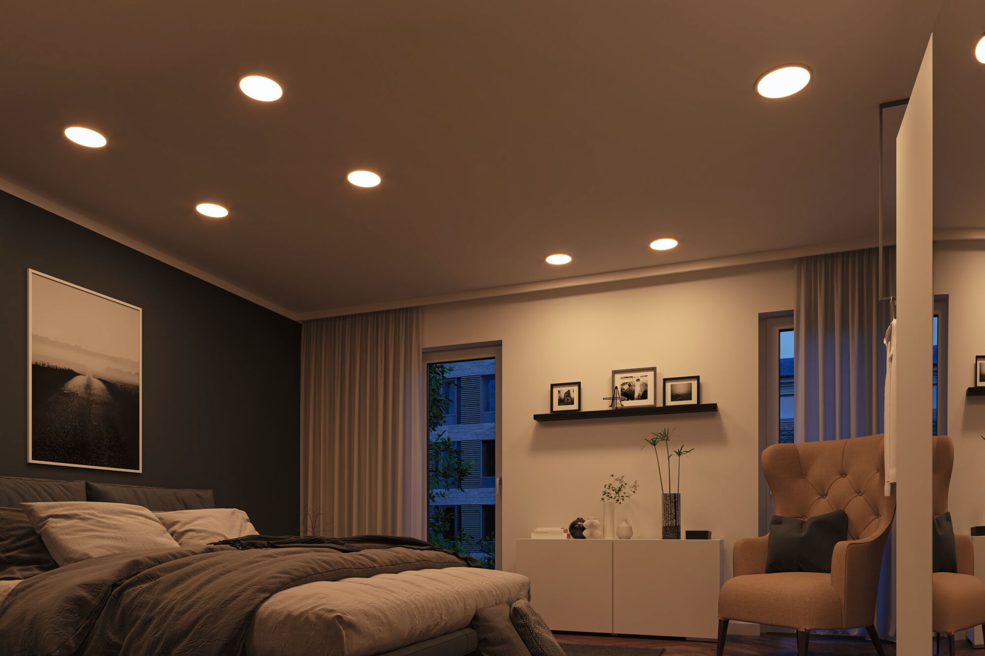 Modern bedroom with warm white LED recessed lights in ceiling providing cozy ambient lighting