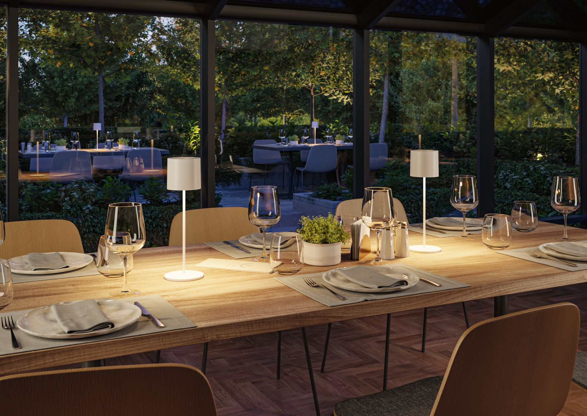 Modern wooden dining table with two white LED table lamps in cozy dining room setting.