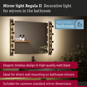 Matt black Regula II mirror light with decorative bulbs ideal for bathroom wall mounting