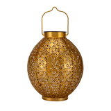 Round lantern in gold metal with intricate floral pattern and handle for decorative lighting and ambiance