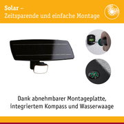 Schwarzes Solarpanel mit integriertem LED-Licht, Montageplatte mit Wasserwaage und Kompass für einfache Installation