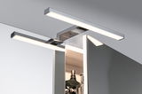 Applique miroir LED moderne en chrome avec lumière blanc chaud pour salle de bain et coiffeuse.
