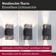 Schwarze Wandleuchte Tharin aus Metall mit verstellbaren Lichtkegeln und warmweißem Licht für Akzente