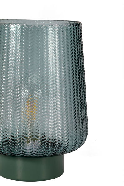 Glazen tafellamp met groene voet en gestructureerde transparante kap voor sfeervolle verlichting.