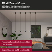 Minimalistisches schwarzes Pendel mit abgedecktem Leuchtmittel an Deckenleiste im modernen Esszimmer