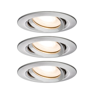 Three round recessed spotlights in brushed aluminium with warm white LED light for modern indoor lighting
