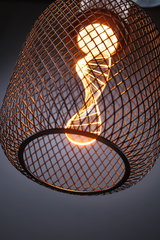 Modern pendant lamp with black metal mesh and warm white LED bulb for ambient lighting in living spaces