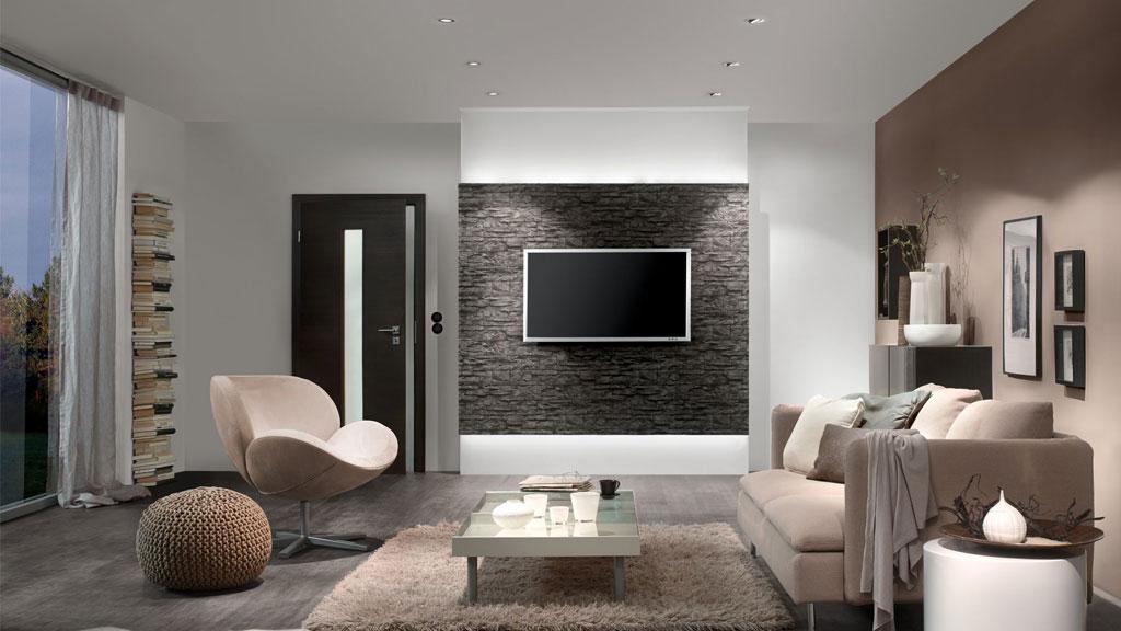 Salon moderne avec éclairage LED direct au plafond, canapé beige et tapis gris pour une ambiance chaleureuse.