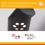 Zwarte solar buitenlamp met geïntegreerde bewegingssensor en LED voor energiezuinige tuinverlichting