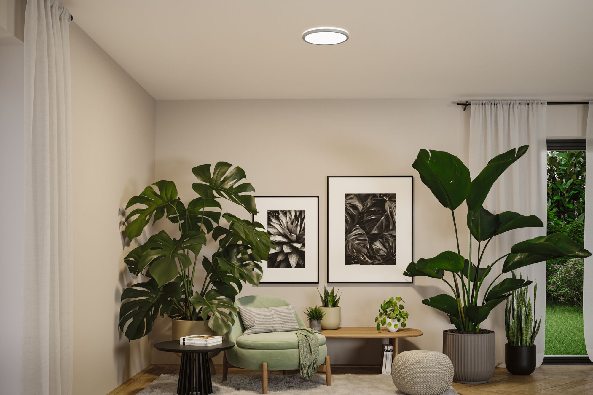 Round white LED ceiling light in modern living room with green plants and cozy armchair.