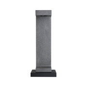 Grey concrete outdoor light post with black metal base for garden lighting