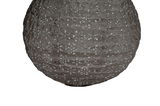 Round grey paper lampshade with floral cutouts for decorative lighting effect