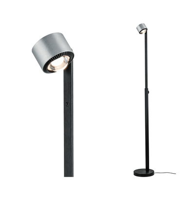 Modern floor lamp with black metal base and silver aluminum spotlight head for focused lighting