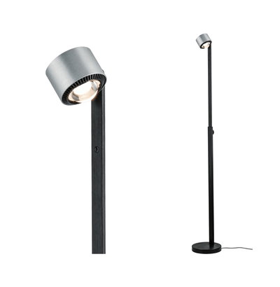 Modern floor lamp with black metal base and silver aluminum spotlight head for focused lighting