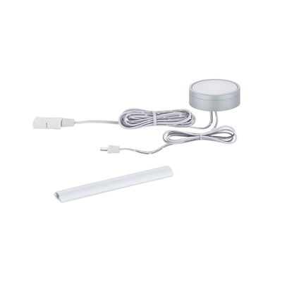 Round silver LED under-cabinet light module with white cable and white cover profile for furniture lighting