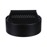 Round black LED light with textured plastic diffuser for modern indoor lighting solutions