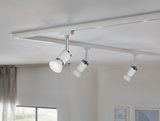 Tre hvide LED-spotlights på hvid skinne til fleksibel moderne rumbelysning