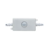 White plastic housing with integrated motion sensor and cable connections for light control