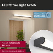 Matt black LED mirror light Arneb with minimalist design for bathroom lighting