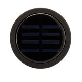 Round black solar panel with glass cover and matte frame for energy-saving lighting solutions