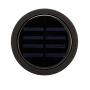 Rundt sort solpanel med glasdæksel og mat ramme til energibesparende belysning