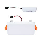 Rectangular white LED recessed panel with cables and orange clips for ceiling lighting installation