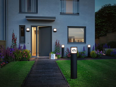 Modern house entrance with black LED bollard light showing number 47c and anthracite wall lamps.