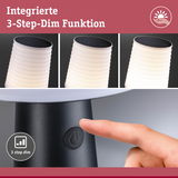 Schwarze Lampe mit weißem, geripptem Lampenschirm und integrierter 3-Stufen-Dimmfunktion per Knopfdruck