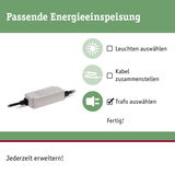 Weißer Transformator mit schwarzem Kabel zur passenden Energieeinspeisung für LED-Leuchten und Kabelsysteme