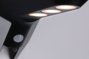 Black recessed LED light with three warm white bulbs, modern indoor lighting fixture