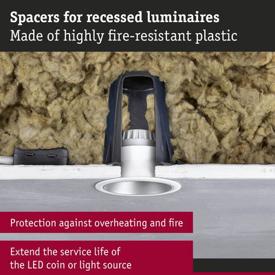 Black fire-resistant plastic spacers for recessed LED luminaires preventing overheating and fire