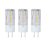 Three transparent LED bulbs with white bases and yellow diodes for energy-efficient lighting solutions